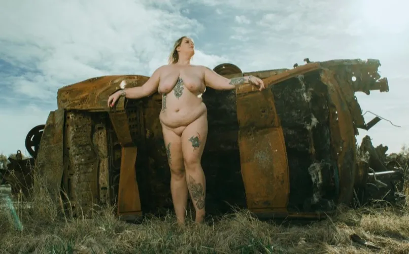 Thumbnail Title: Exploring a Burnt-Out Car Discovery Alongside River Swimmers by Cindytyne_NZ in BBWnudists Category