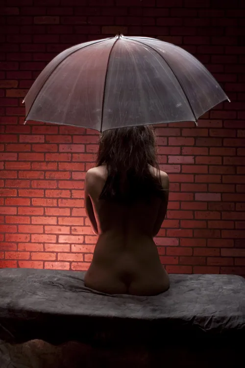 Thumbnail Brunette Seductively Waiting in the Dark Against a Brick Wall by ElderVixen: A Classy Sexy Delight