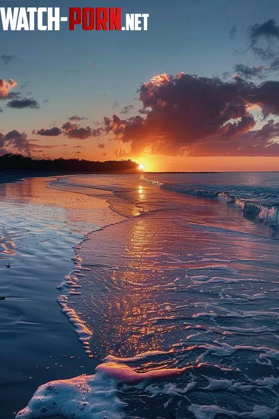 A sunset over the beach in a Canadian bay by AppropriateTheme1571