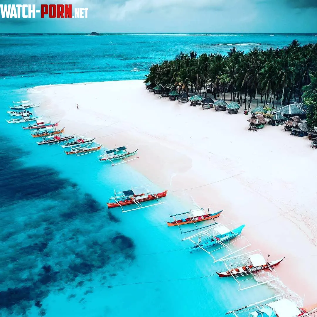 The vibrant hues of Siargao Islands coastline by luvanimegirl
