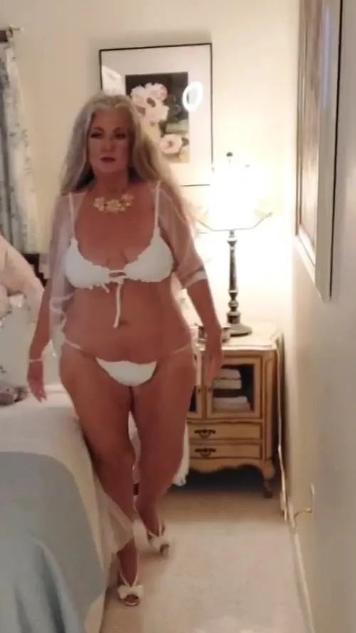 Thumbnail Modeling Magic: White Bikini Trends by Able_Big_1555 in maturewoman Category