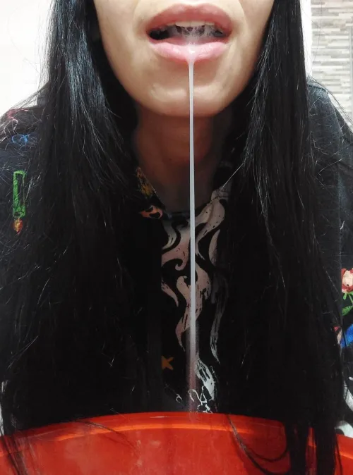 Thumbnail Indulge in Spit Fetish with Latinsunshinesol: Let the Thread Drop on Your Face for Desperate Tongue Teasing | Authored by latinsunshinesol