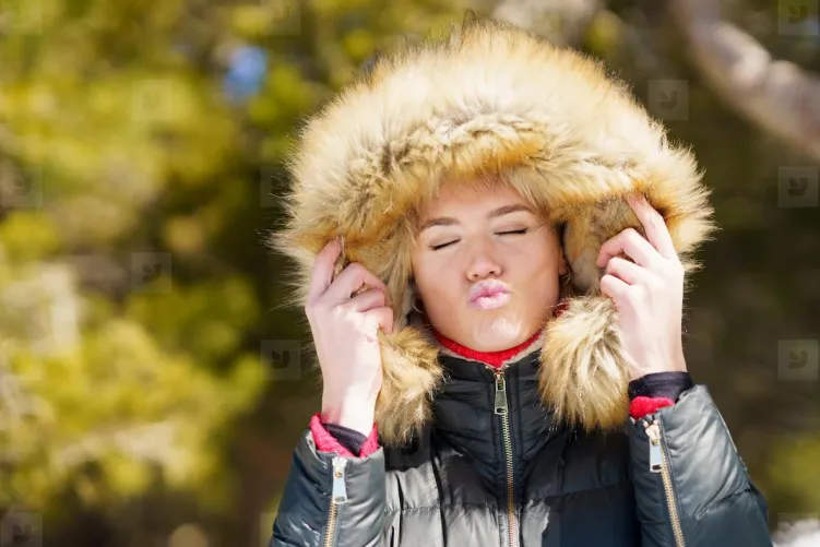 Thumbnail Discover Pouting Charm in a Fur Hood