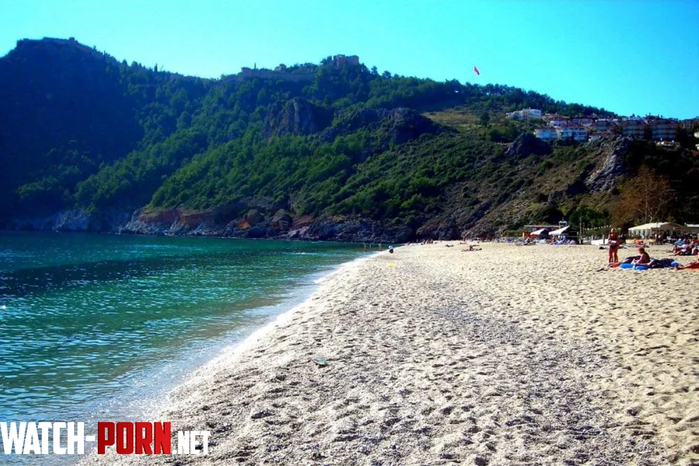 Beach with beautiful golden sand and mountains in Turkey by Tangcityshop