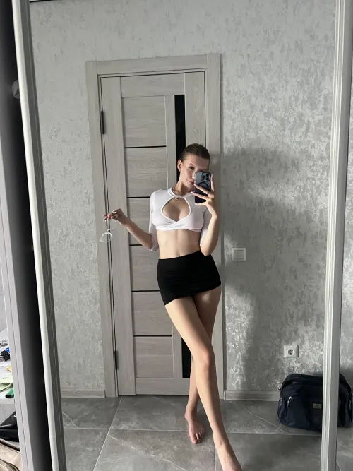Thumbnail Legs on Display: Short Skirts and a Flirty Flair