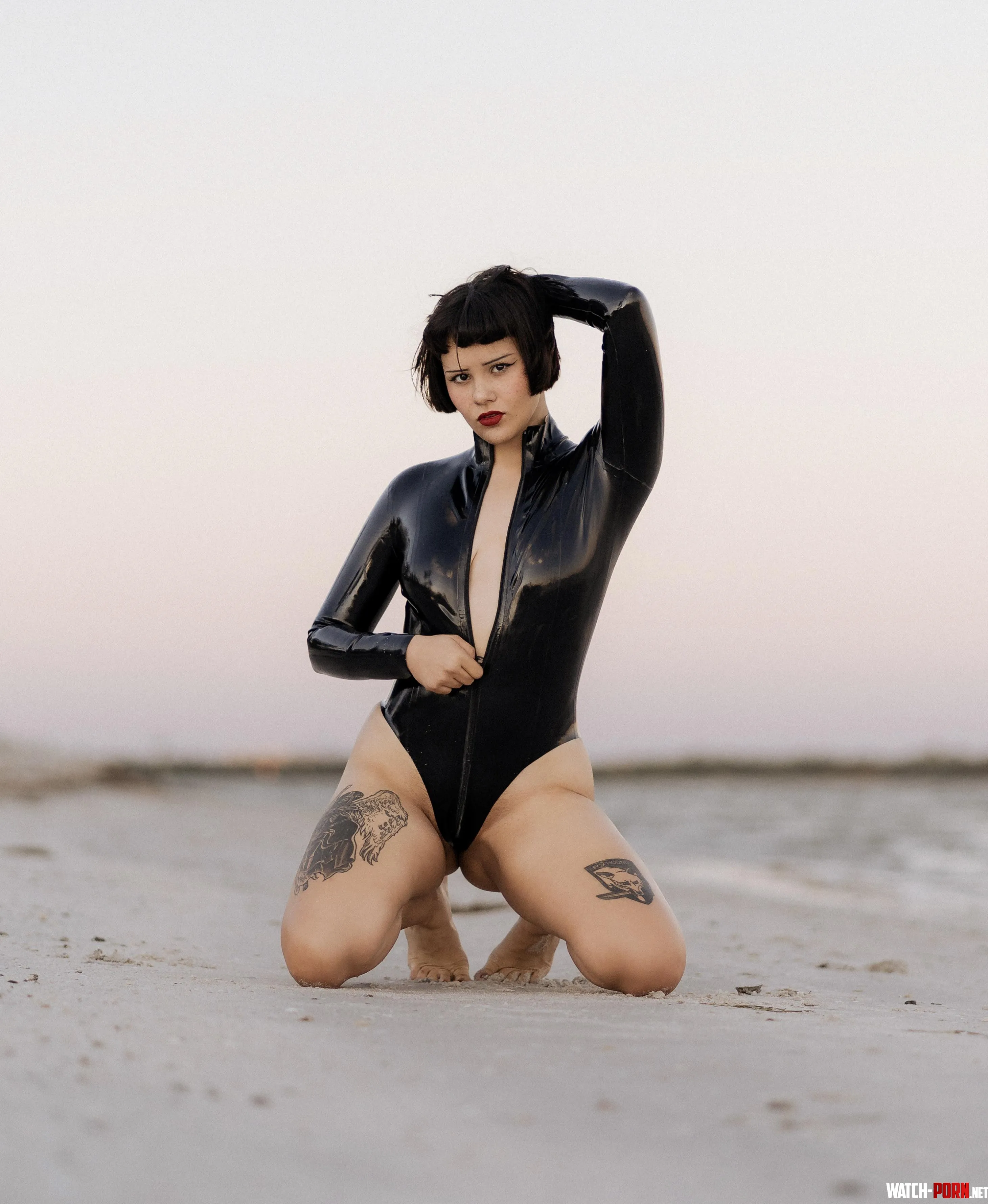 Rubber fun at the beach  by MistressPerpetua