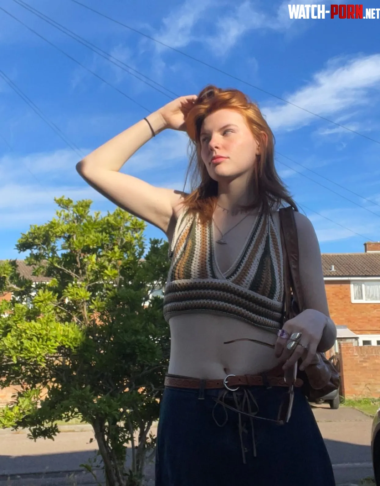 classy girl in crochet top  by True-Constant-6361