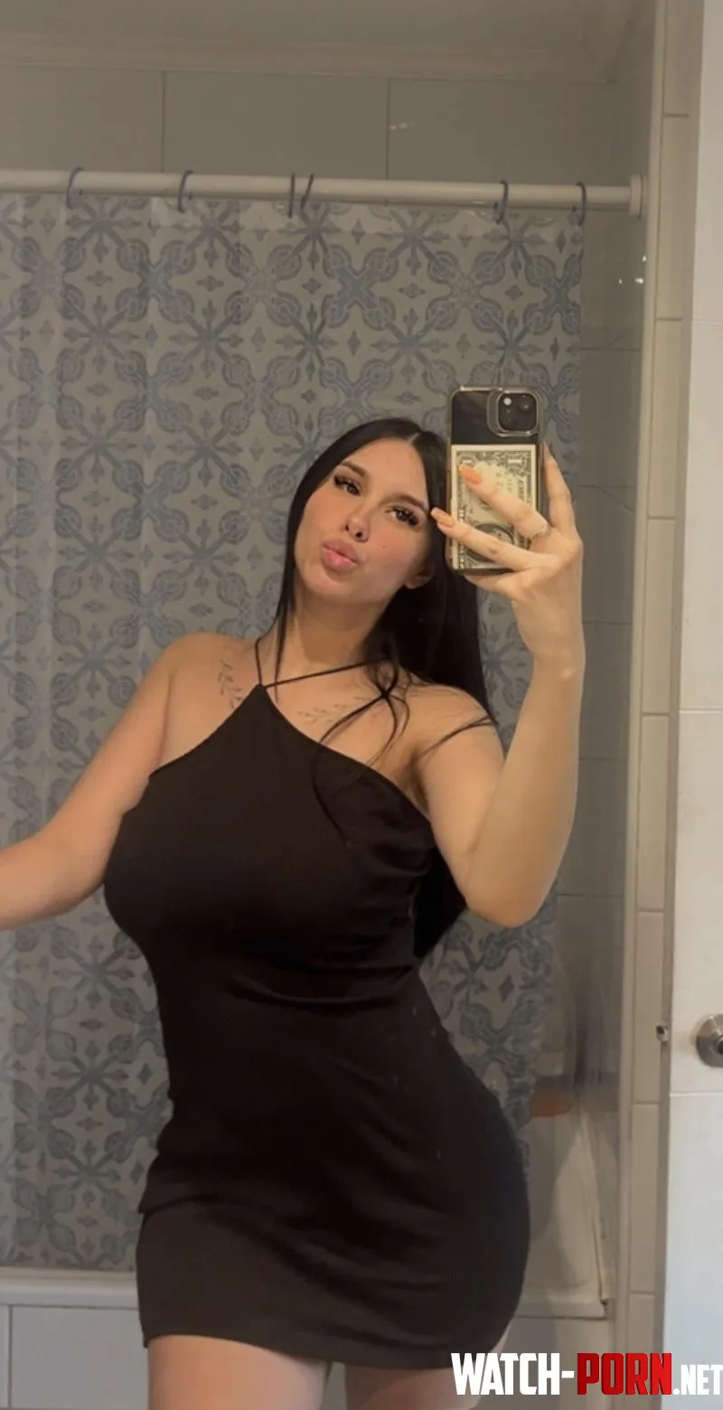 just a cute latina wearing a black tight dress by Sea_Experience_6918
