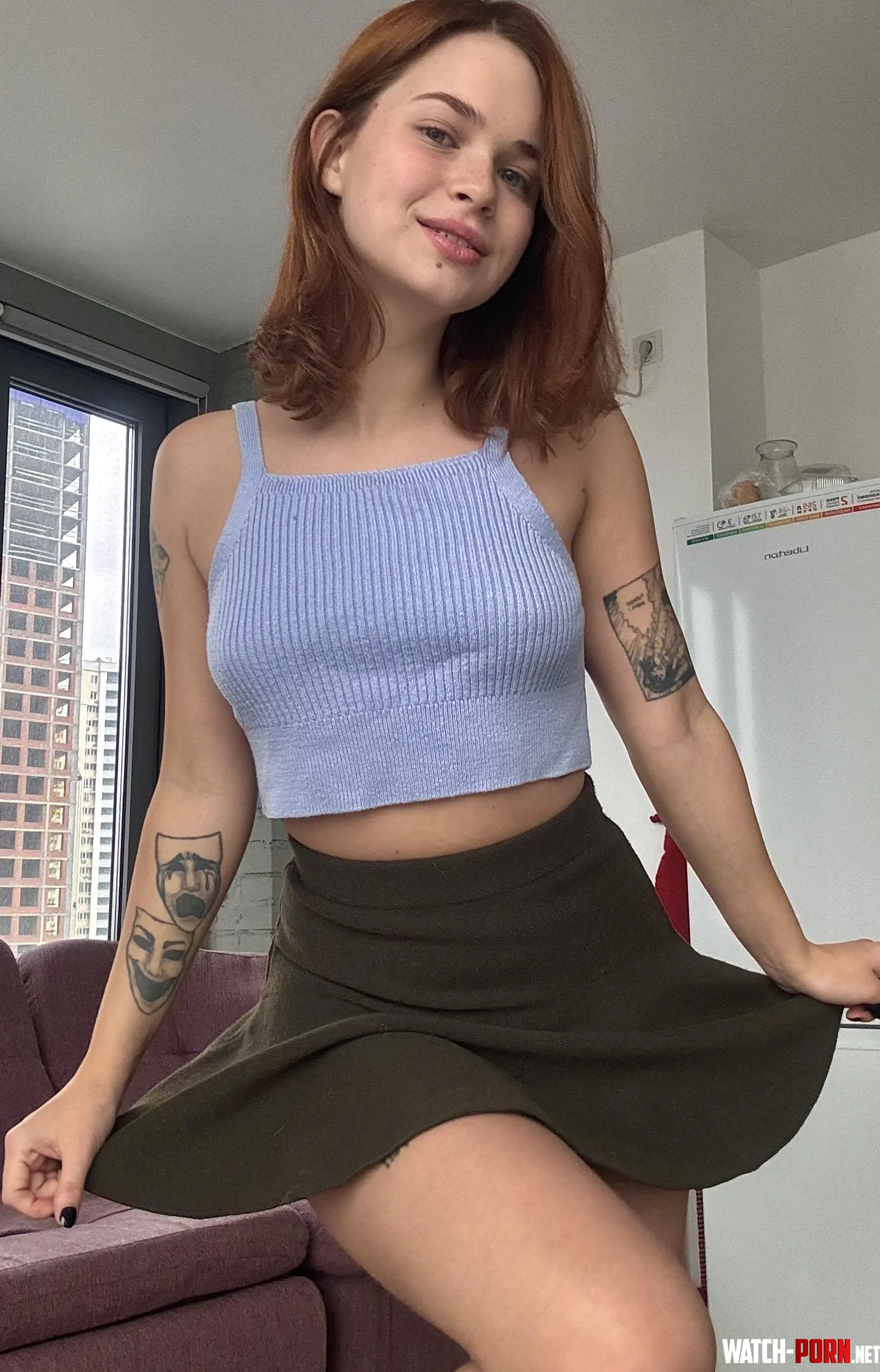 Blue top match well with the olive skirt  by innocentri