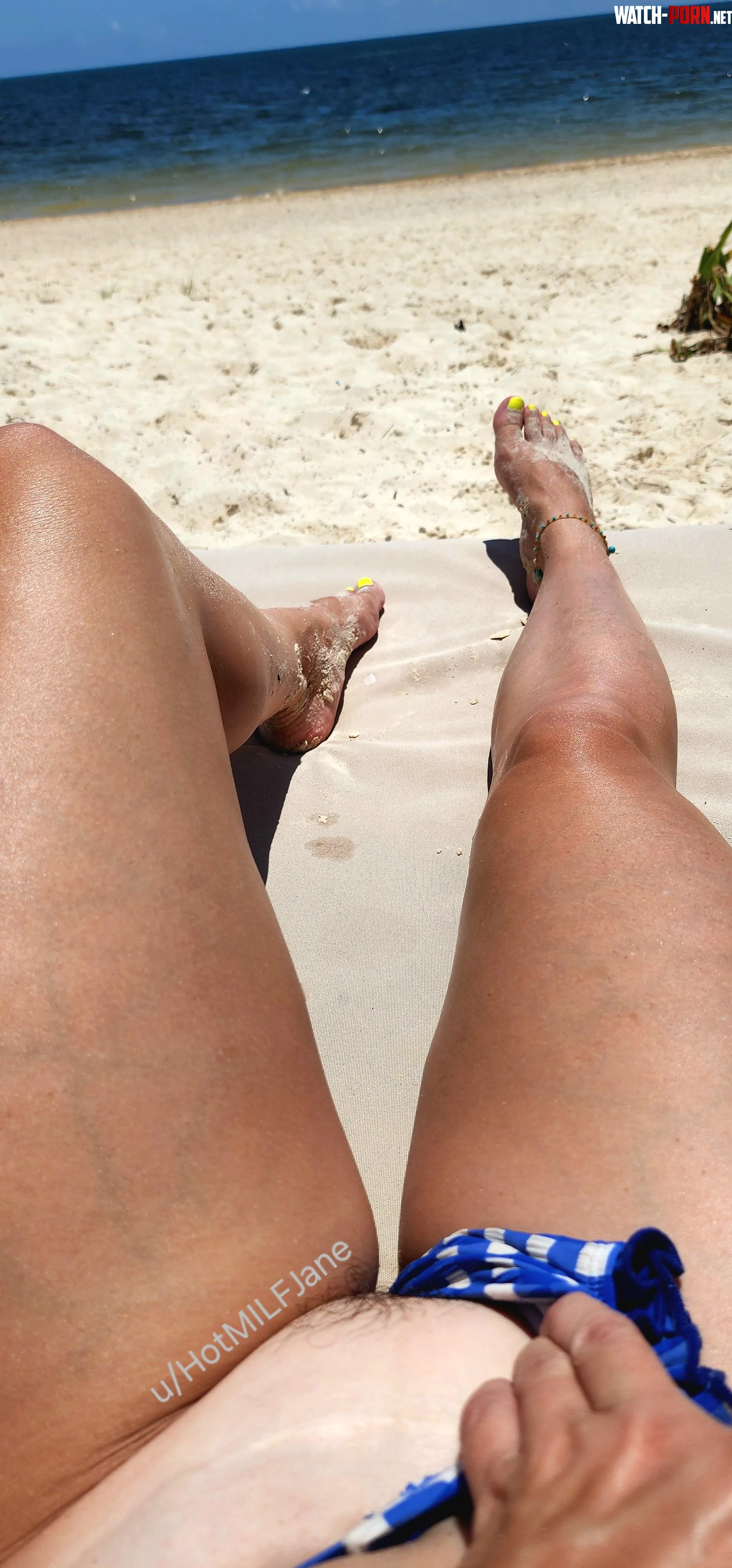 Pulling my bikini aside so I can flash my pussy as you walk by by HotMILFJane