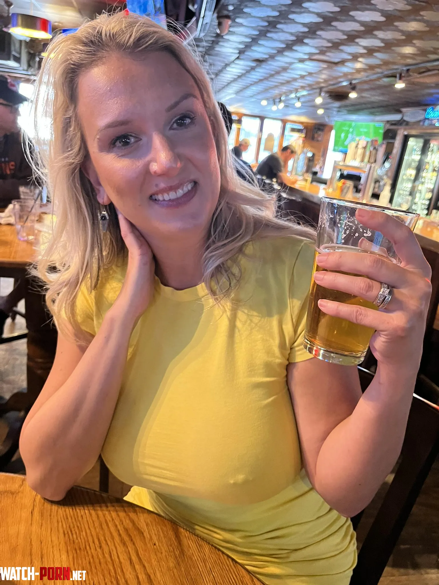 Braless in a bar having a beer by Mrs_Englewood