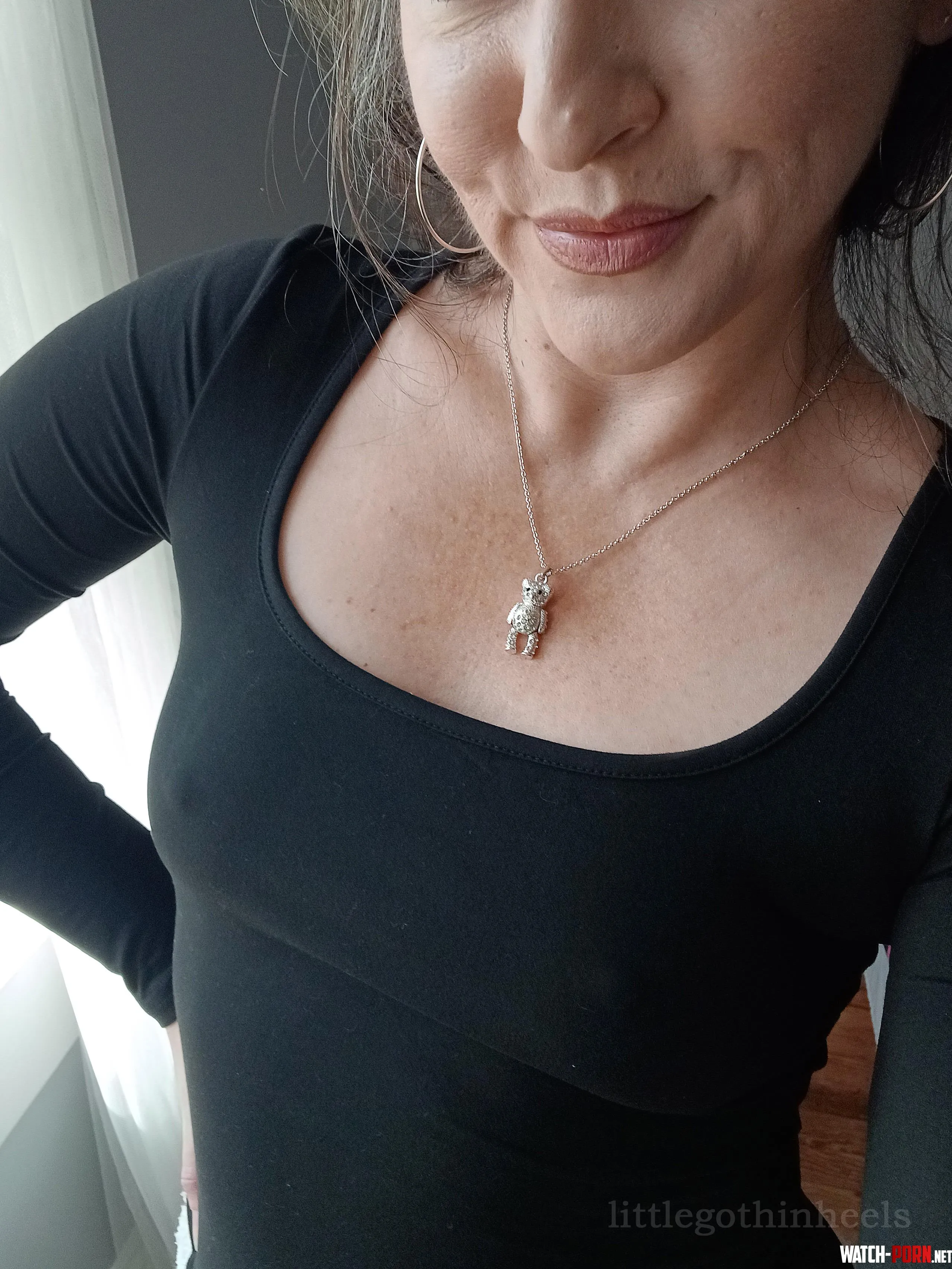 braless in a black top   by littlegothinheels