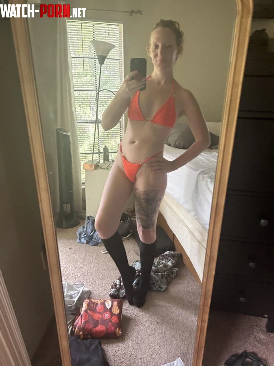 Redhead in an orange bikini  by RedAfricanButterfly