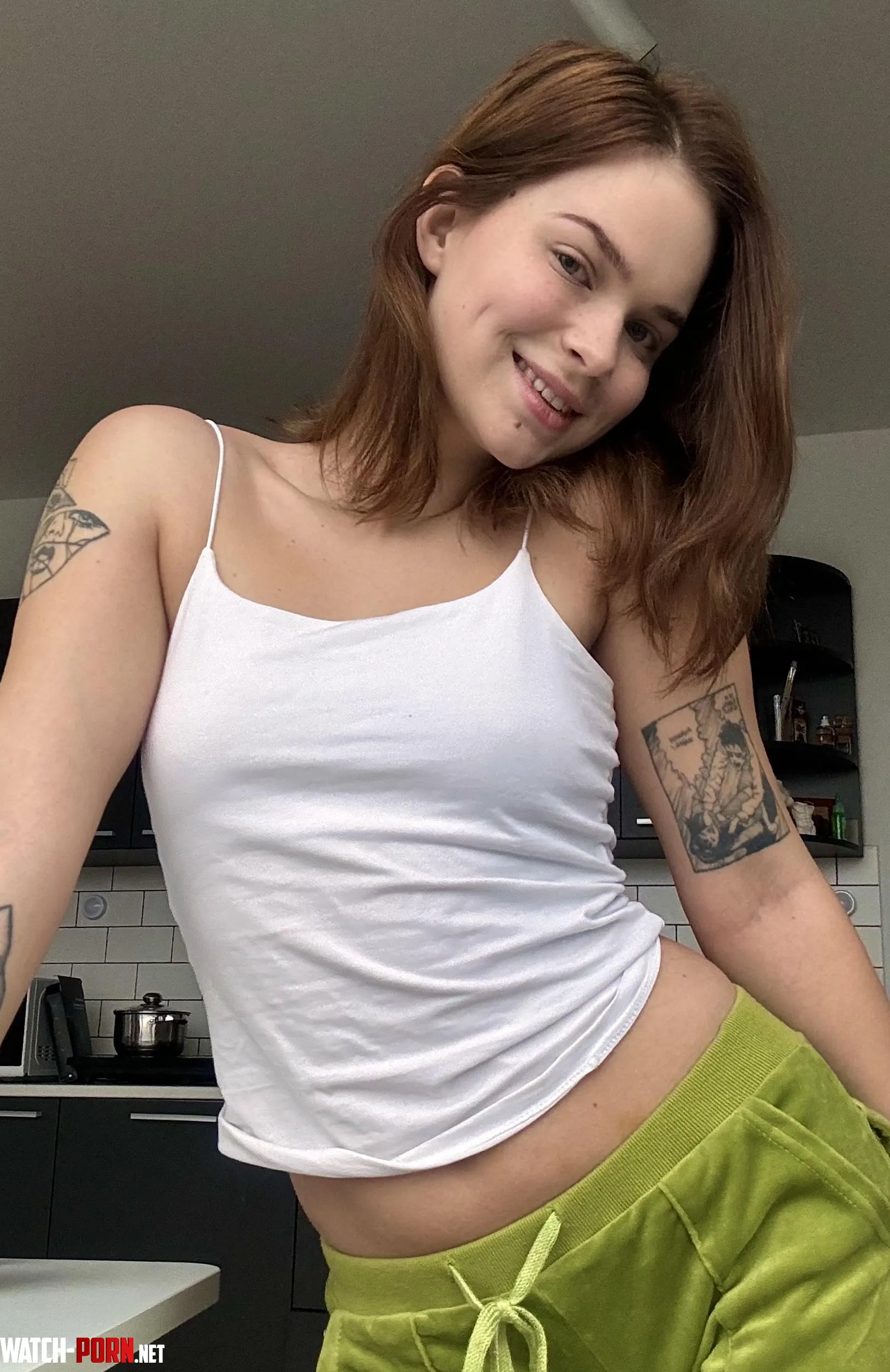 White top is the perfect complement to my red hair  by innocentri