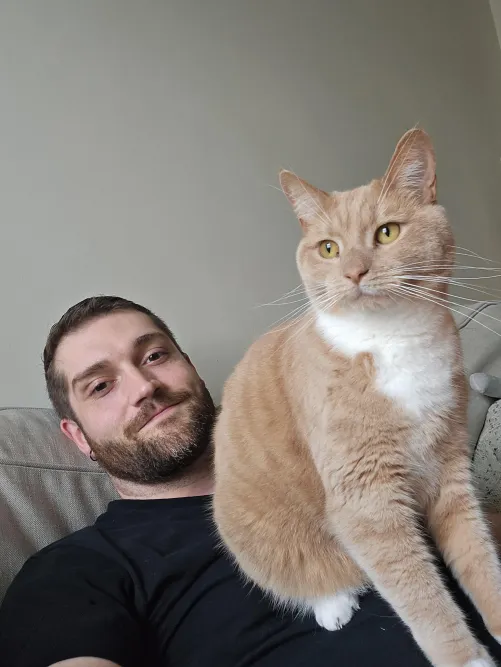 Thumbnail In the 2 years that I adopted this nuisance its the first time he sits on me by Blasmere