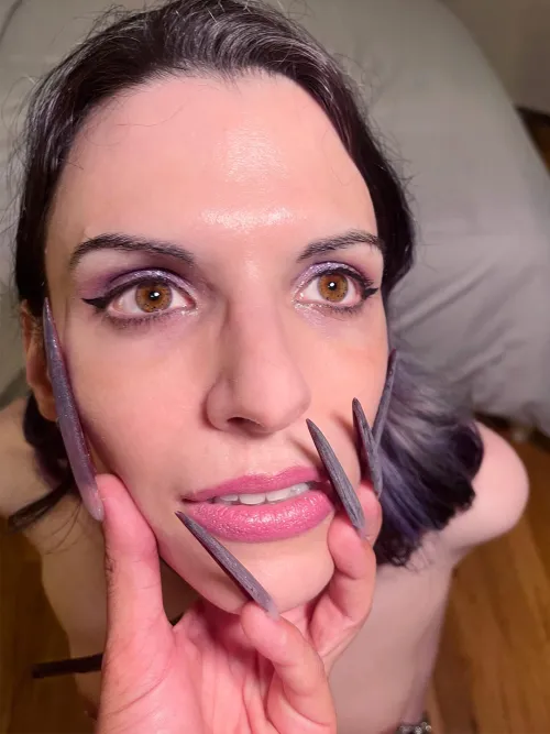Thumbnail EvelynNyte Captures the Artistry of Nails Framing Face O TW in BDSMGW