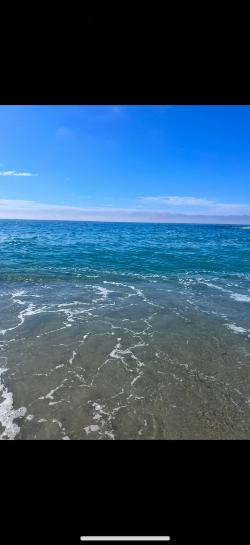 Thumbnail Walking into the Ocean Serenity by Daturaflora at the Beach