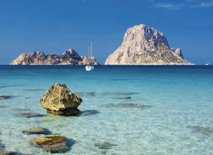 Thumbnail Discover the Magic of Es Vedr Ibiza with RedSpotPassion