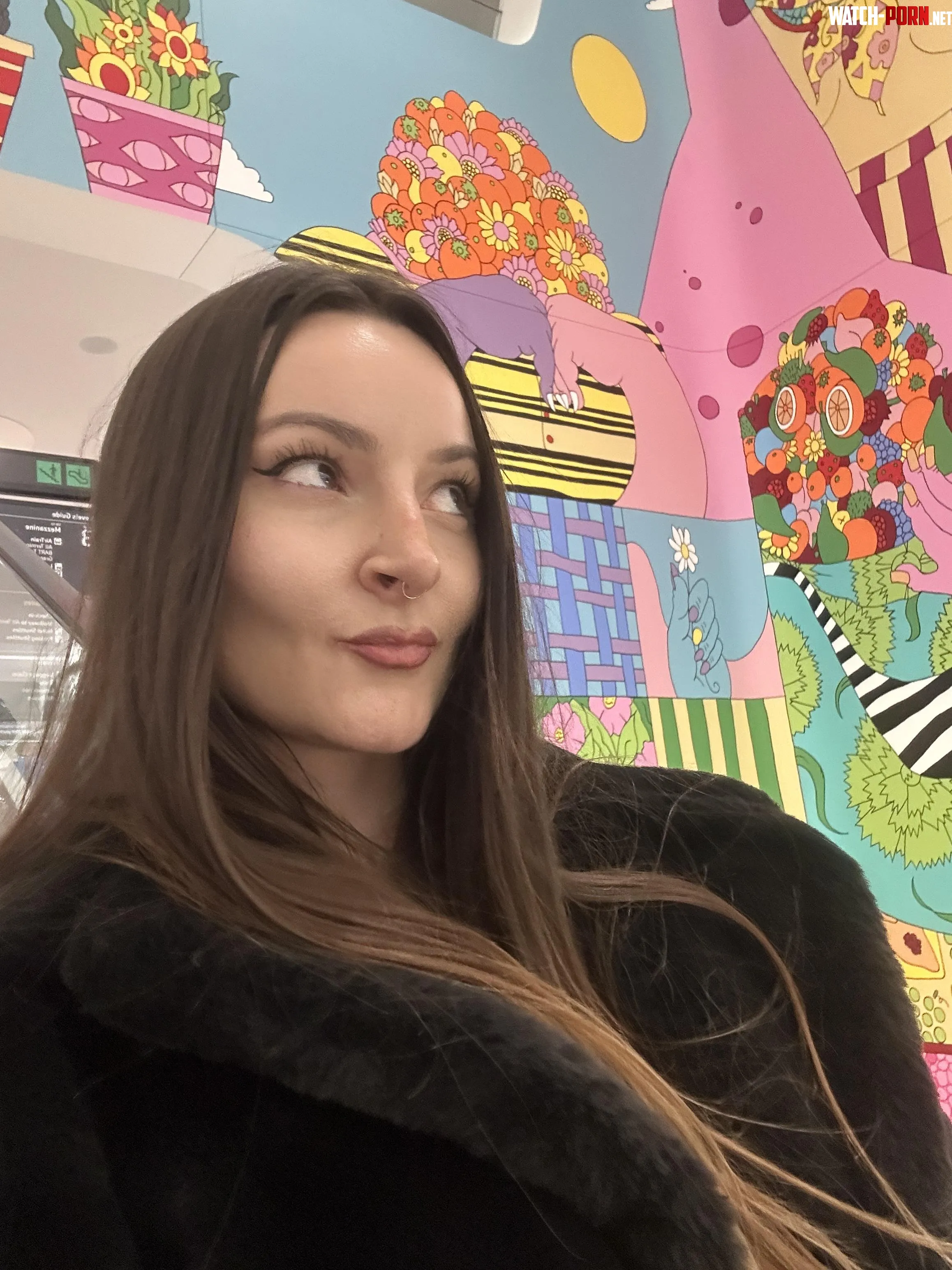 I love the way my brown hair pops against this colorful mural by mistressjenniferhex