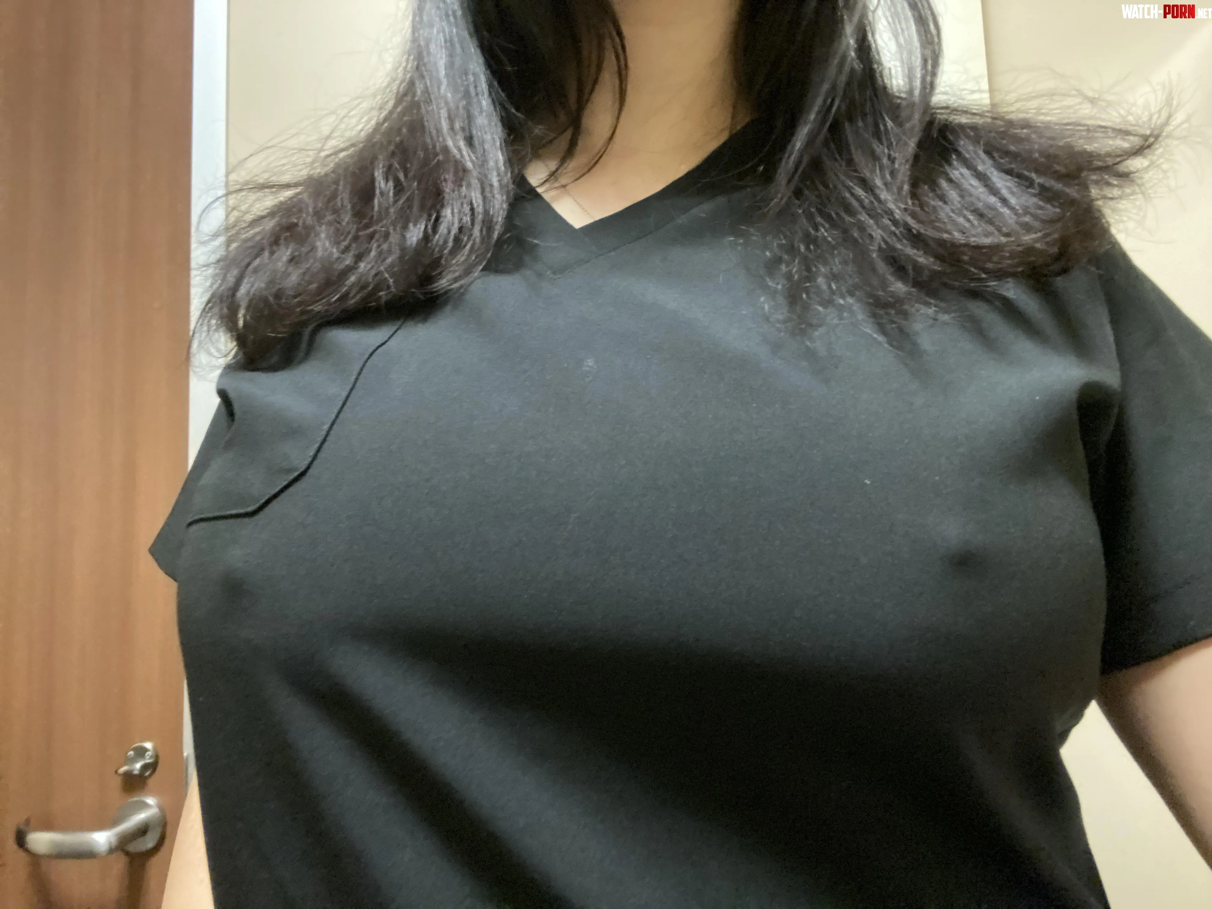 Poking through my undershirt and scrub top  by unit1298