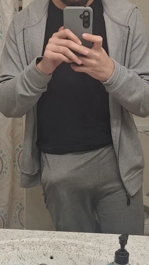 Thumbnail Exploring the Allure of a 20-Year-Old with a Grey Sweats Bulge