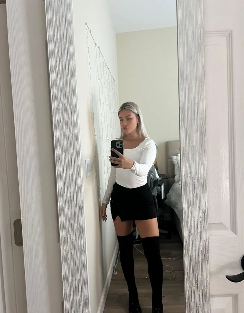 Thumbnail BrandeeKania Stuns in a Tight Black Skirt and Stockings Ensemble