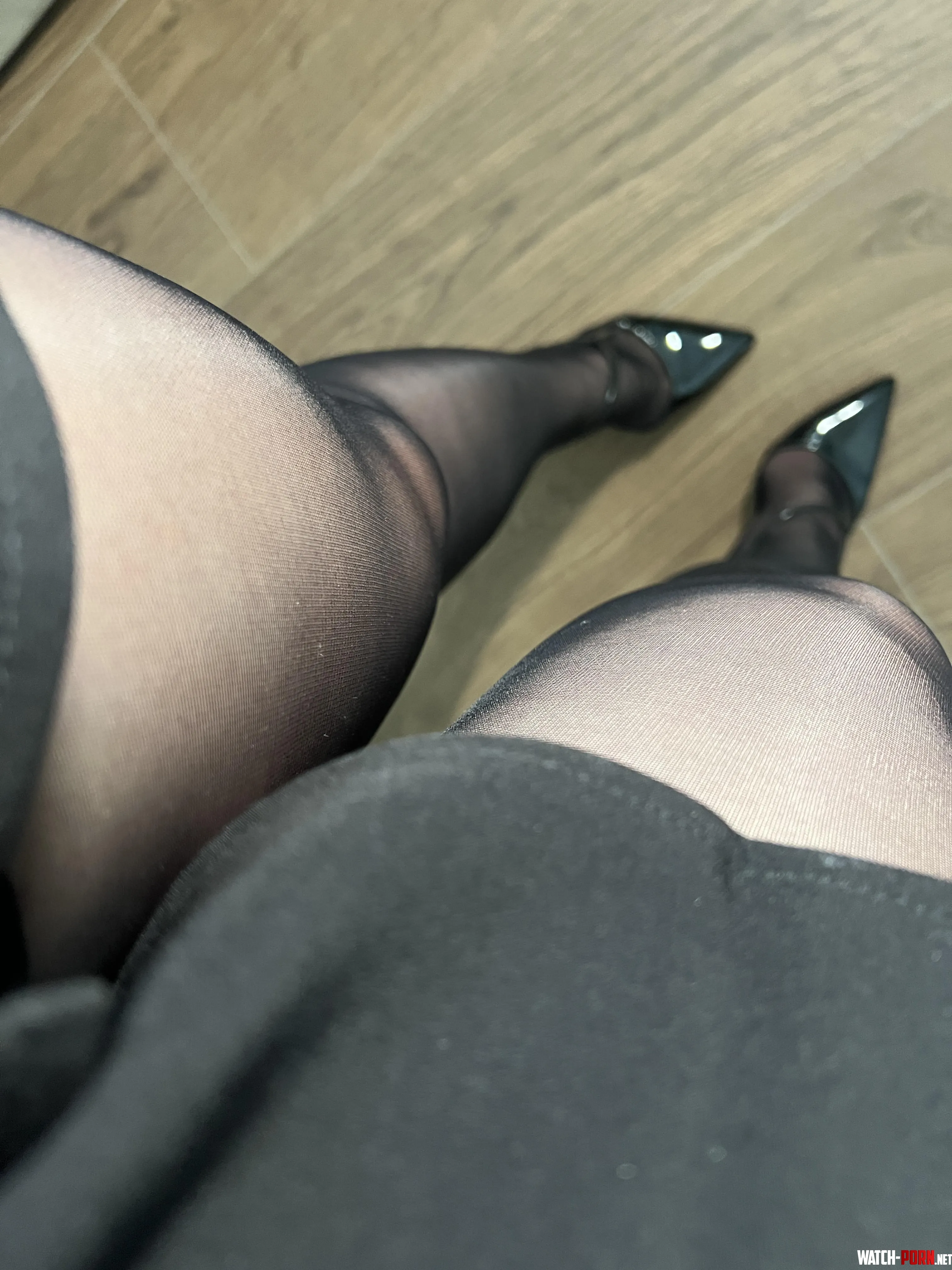 A sheer black view from above… silky nylon hugging every curve just right. by AlinaRoseModel
