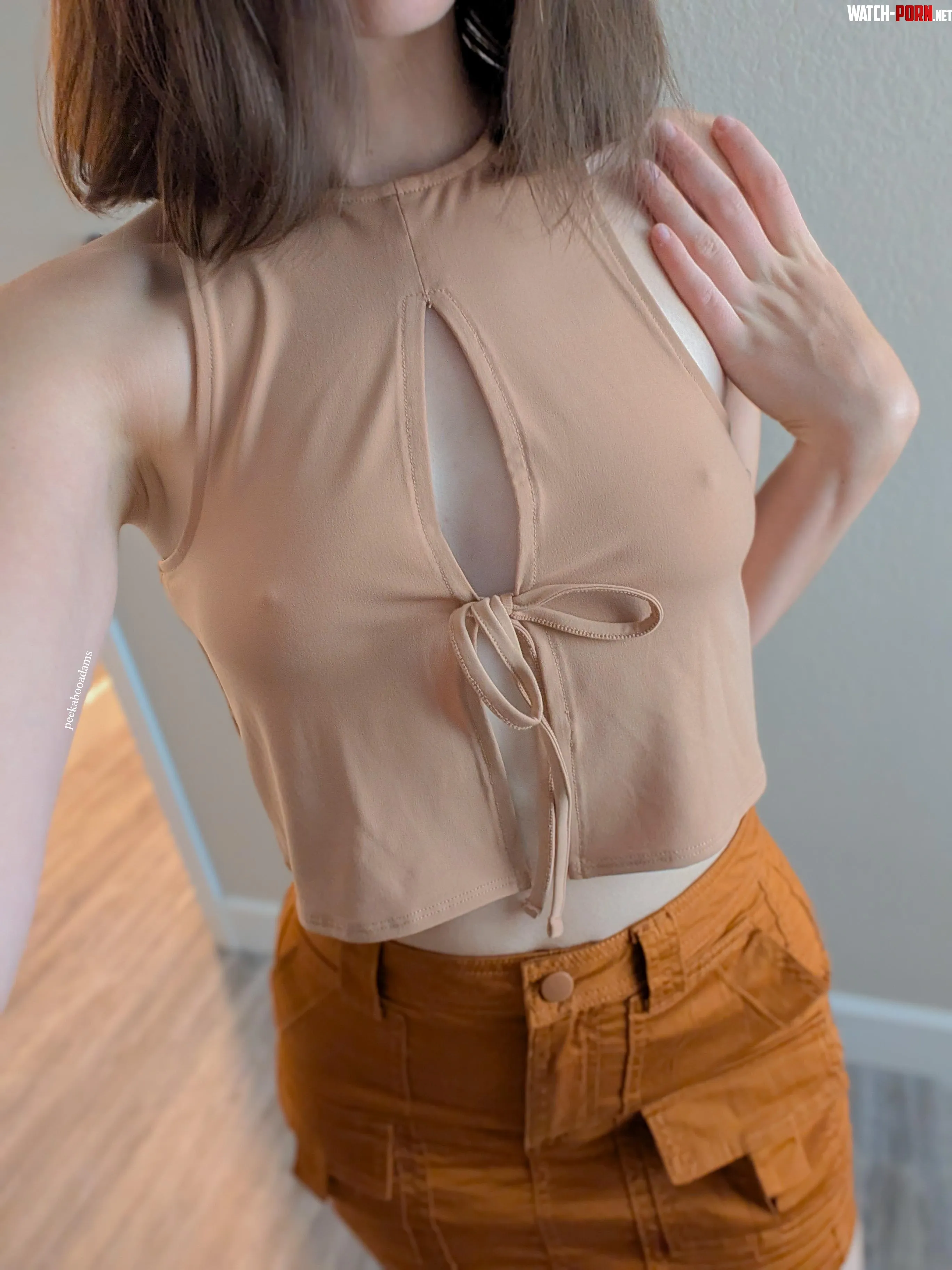 Wearing no bra with a top that ties in the front is risky by peekabooadams