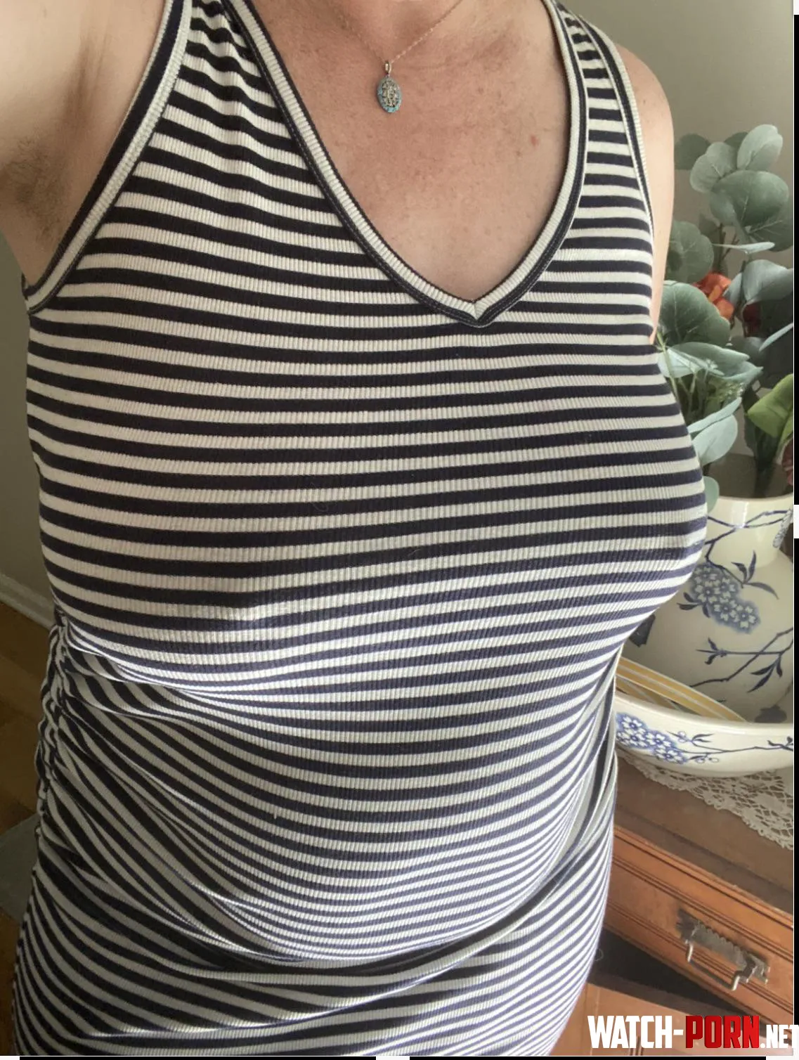 Form-fitting dresses are great for showing braless curves by Frisky_Vanilla