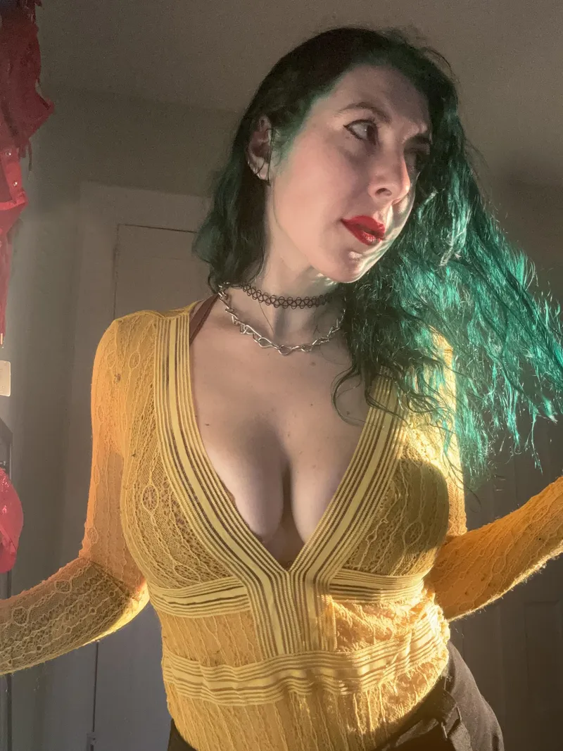 Thumbnail Sunny Reveals: Lighting Up with Cleavage by sirenskiss3 | cleavage