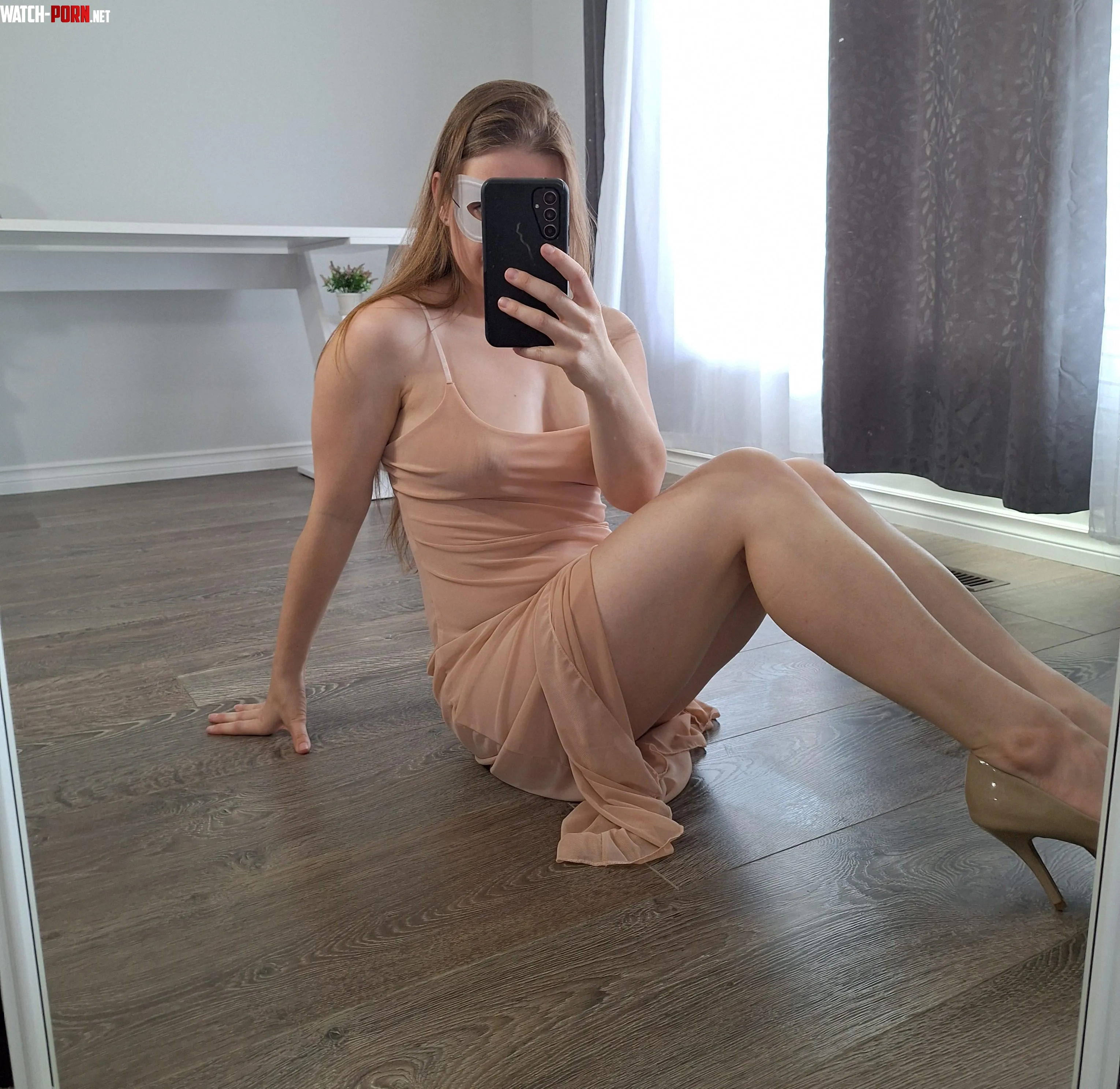 Sitting on the floor showing off my legs by MaskedModel4U
