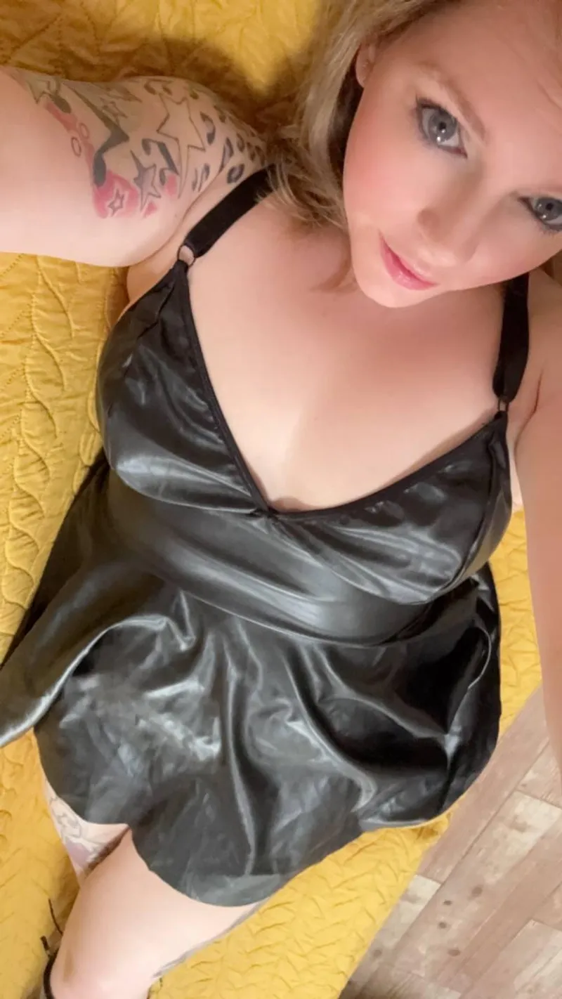 Thumbnail Appreciating a Leather Dress by Sweetiee_Doll in LadiesInLeather Category