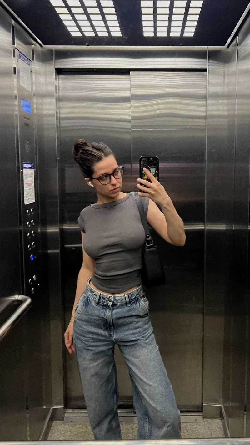 Thumbnail Elevator Selfie: A Playful Pose by basegvd