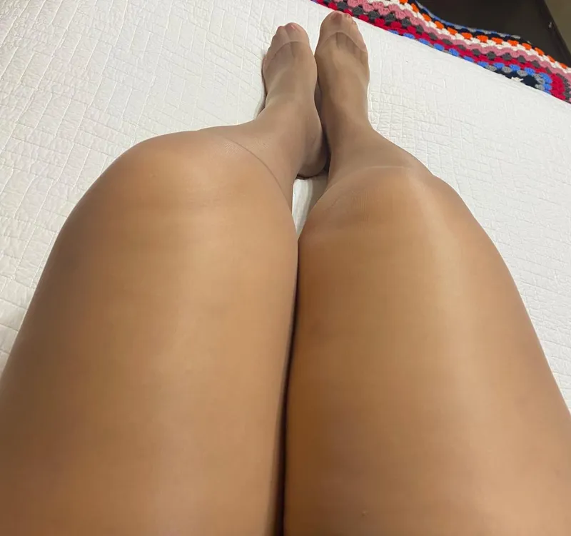 Thumbnail Admire captivating legs in pantyhose - A visual treat awaits!