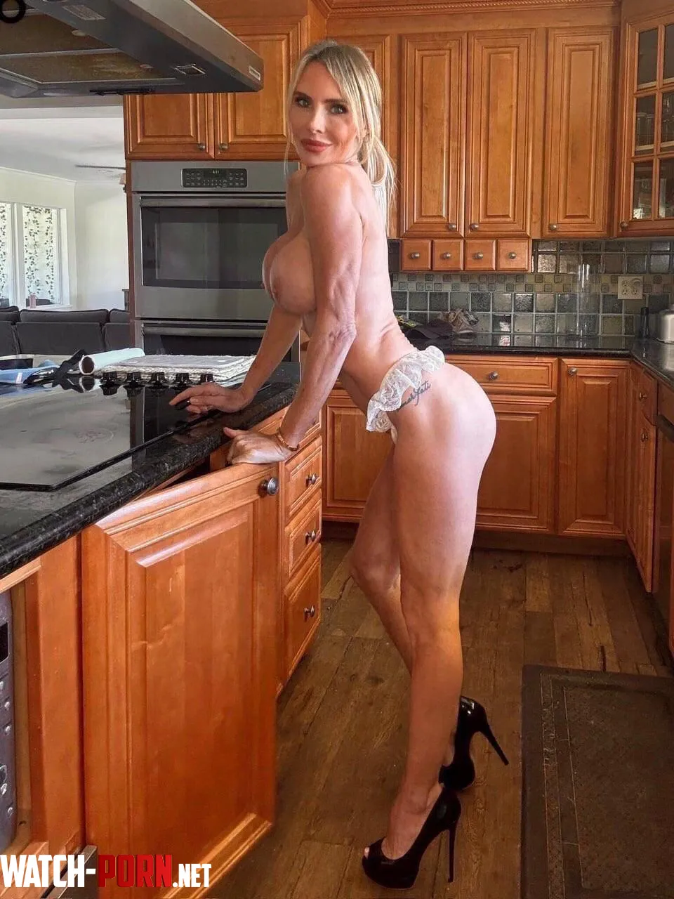 Long legs and high heels in the kitchen by kimboslice-23