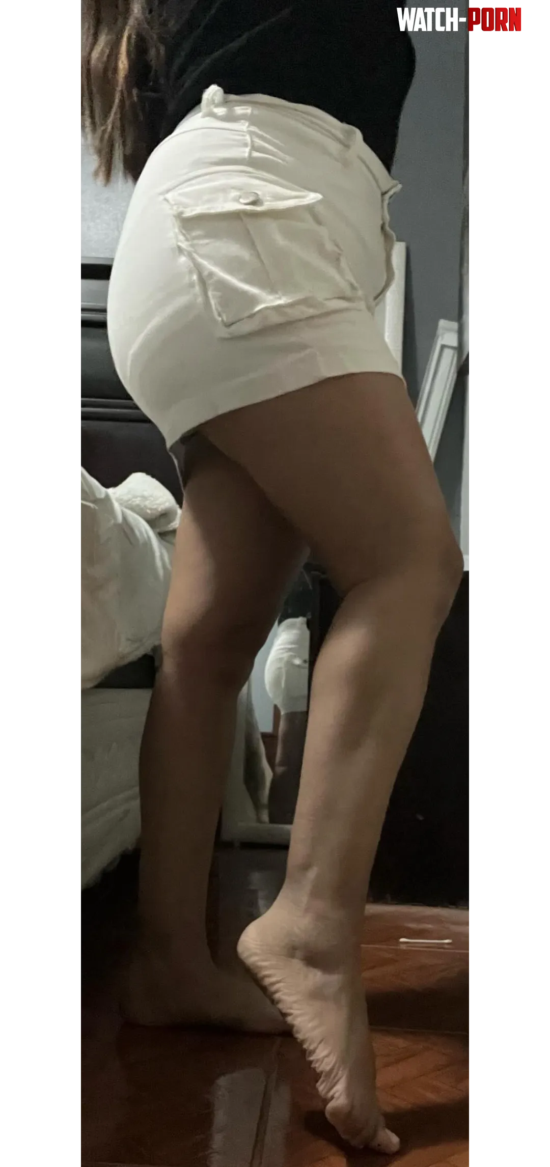 Latina with a miniskirt arching her tiny feet. Is there anything better by CatalinaBustamante