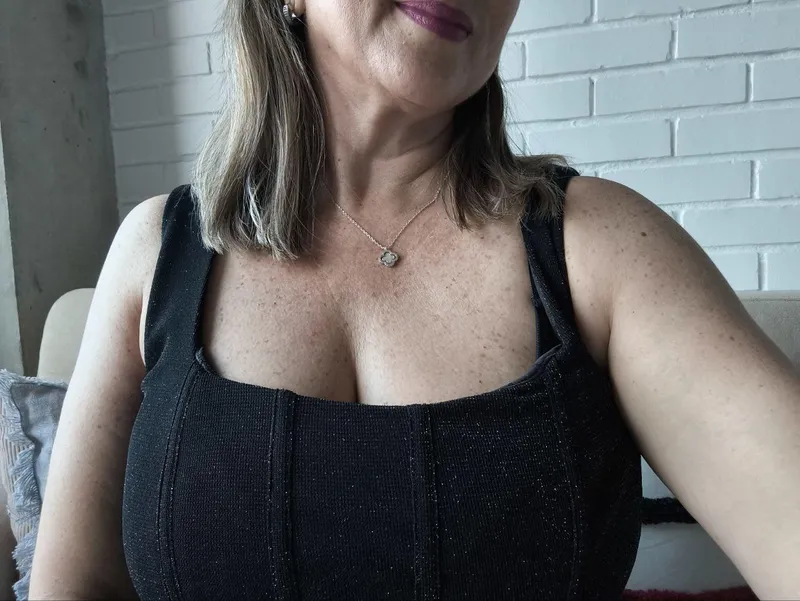 Thumbnail Ageless Elegance: Big Cleavage Dilemma Explored