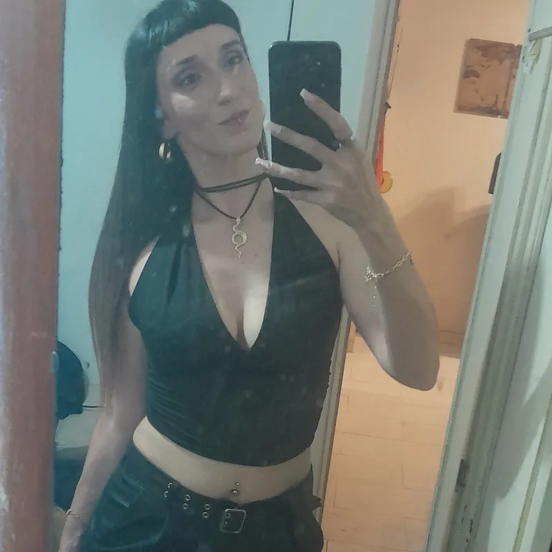 Thumbnail Stylish Choices: Evening Outfit with a Low-Cut Black Top