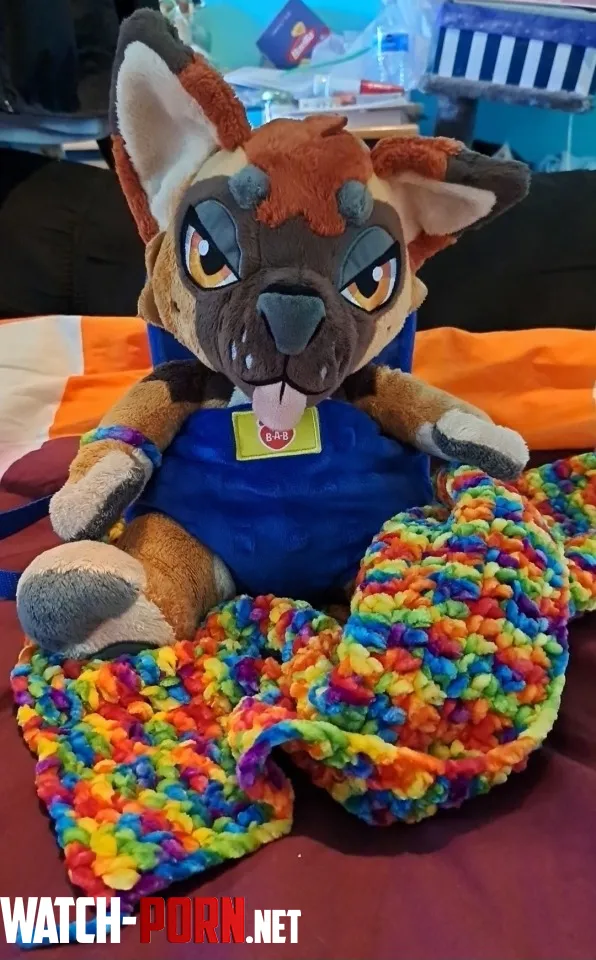 Inspired by a comment on another post from this sub, here’s Rex in a Build a Bear baby carrier + the blanket I crocheted for him 🥰 by ApprehensiveElk1632