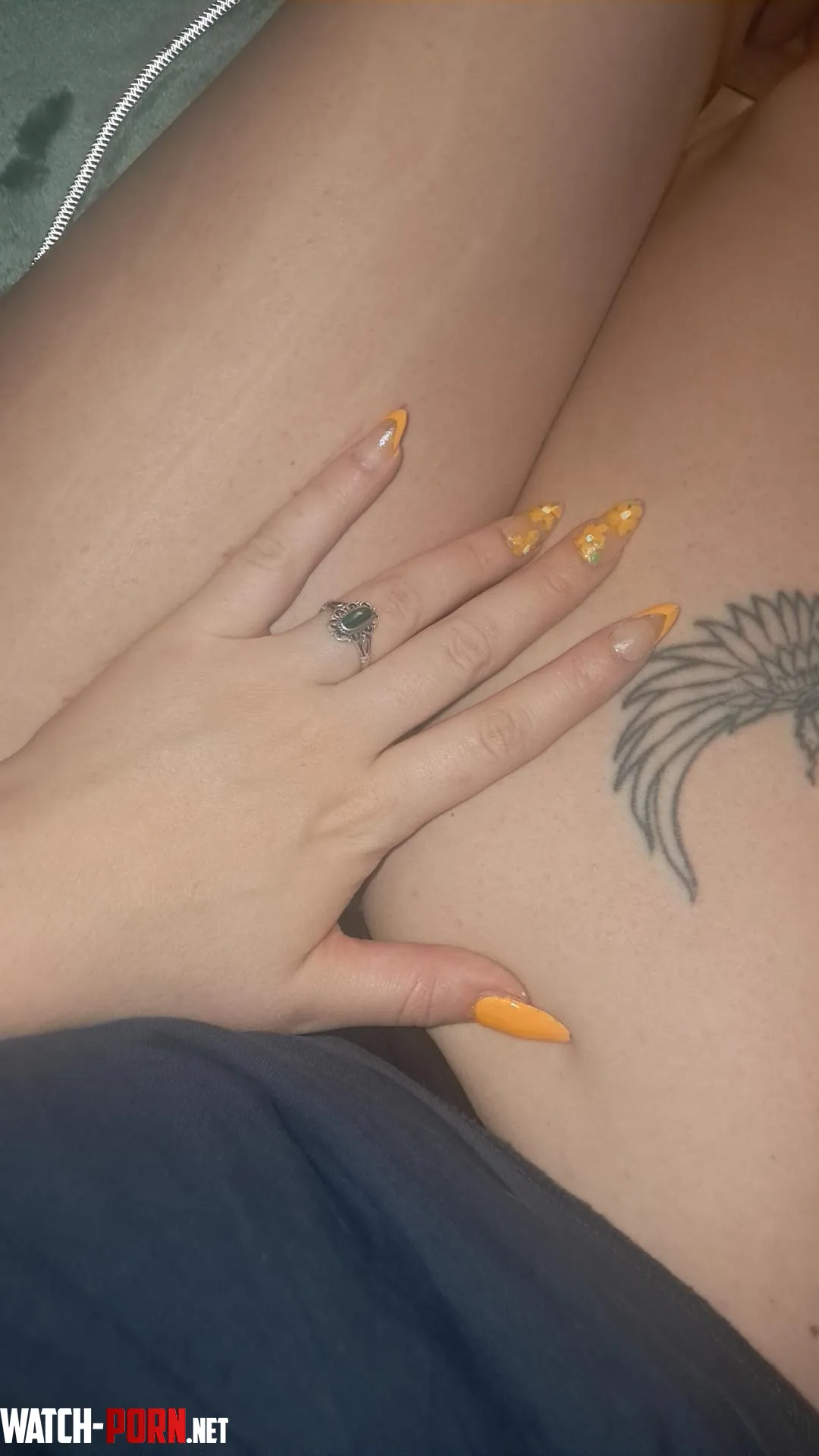 Pretty orange nails leave marks by Exotic-Month727