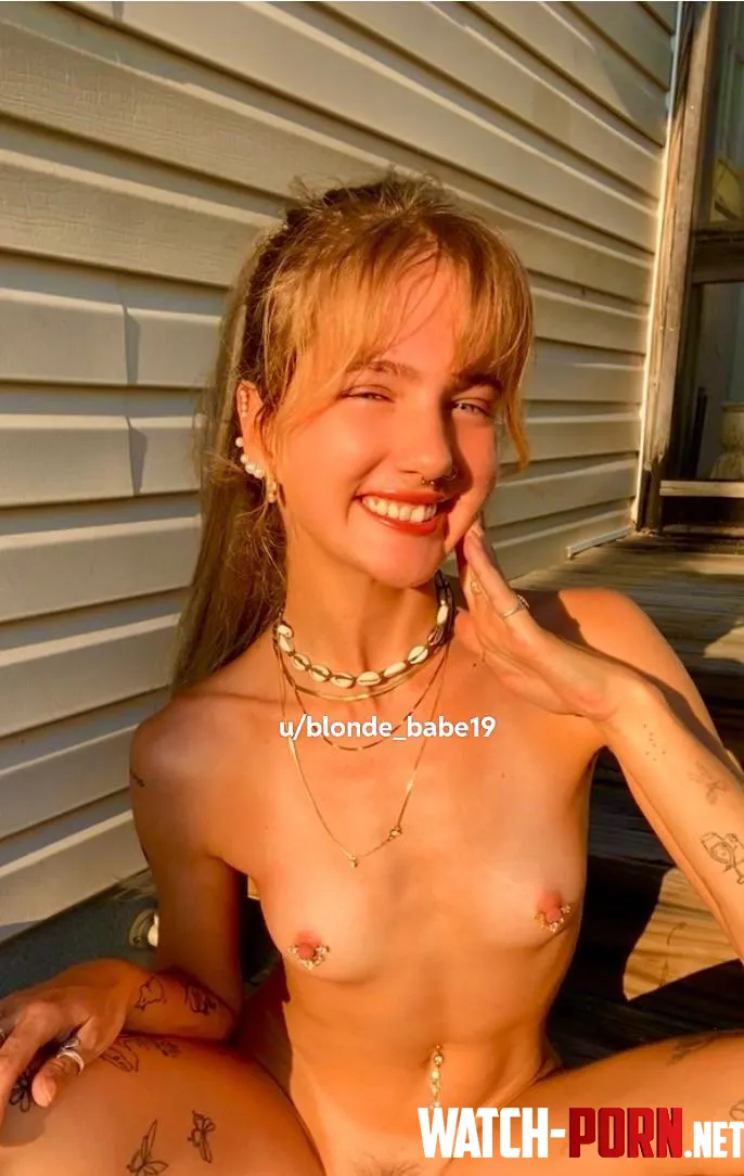 the sun feels so good on my golden skin by blonde_babe19