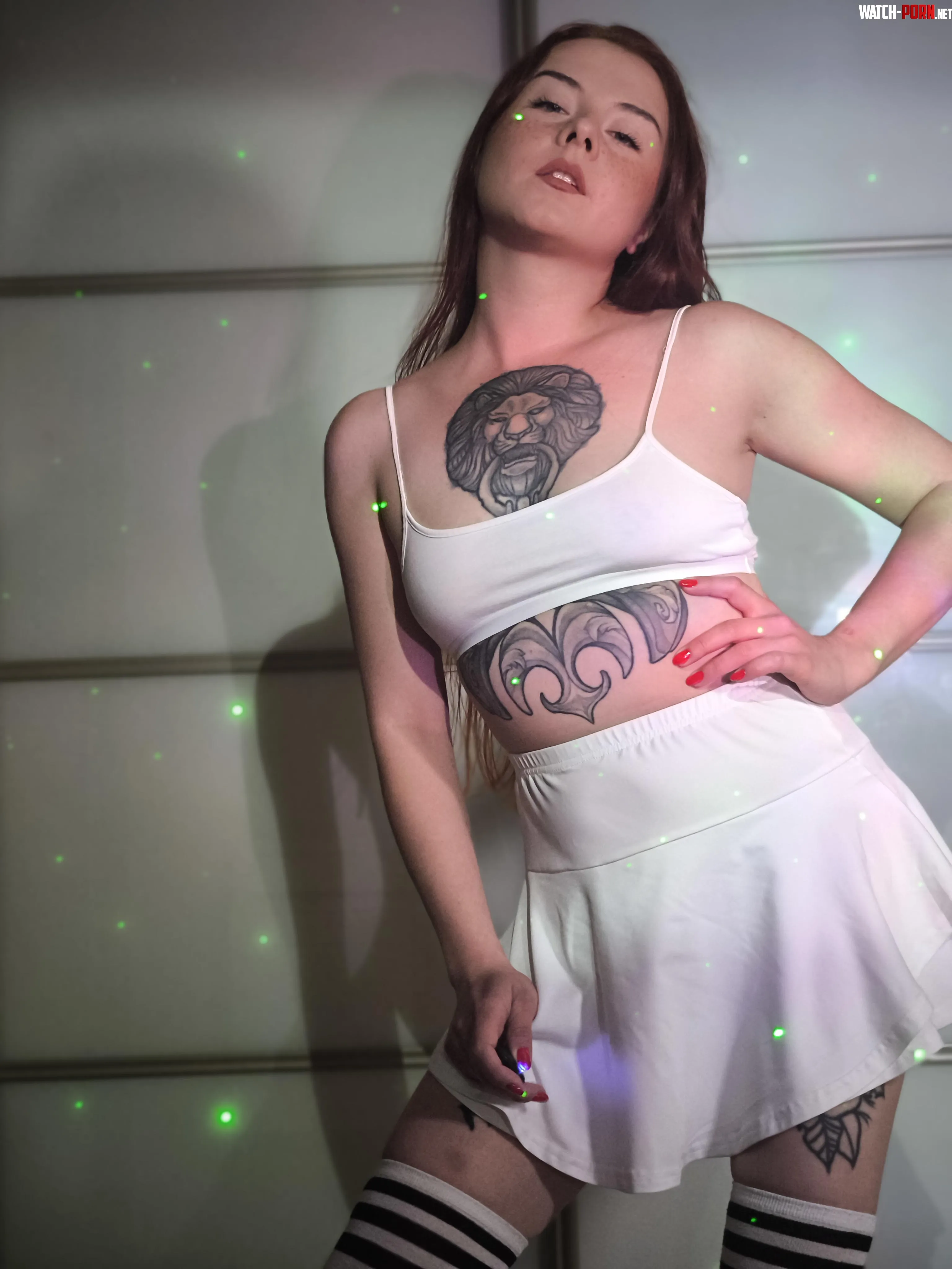 The white top goes really well with the white skirt by InkRuby