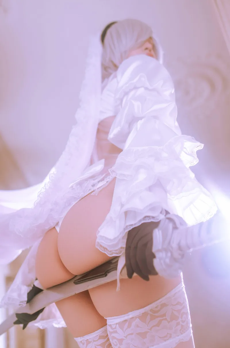 Thumbnail Unveiling 2B.exe in Bridal Mode: Dive into tastycosplayer's Newest Cosplay | tastycosplayer | GWNerdy
