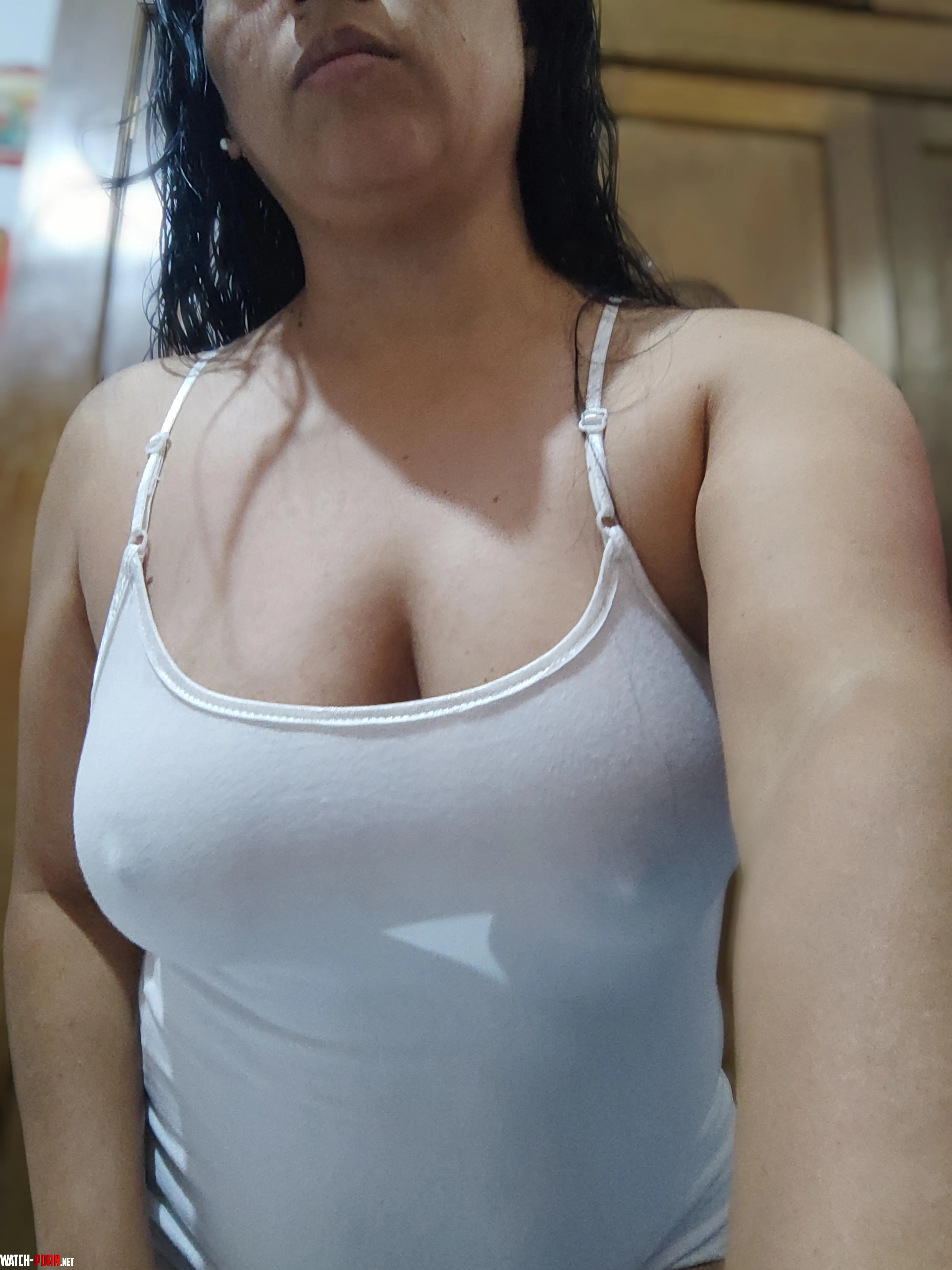 Braless in a sheer white top by Elaryxa