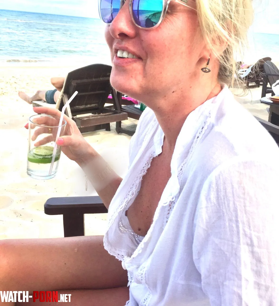 My hubby took this one after the waiter brought me a drink by WesternBig3983