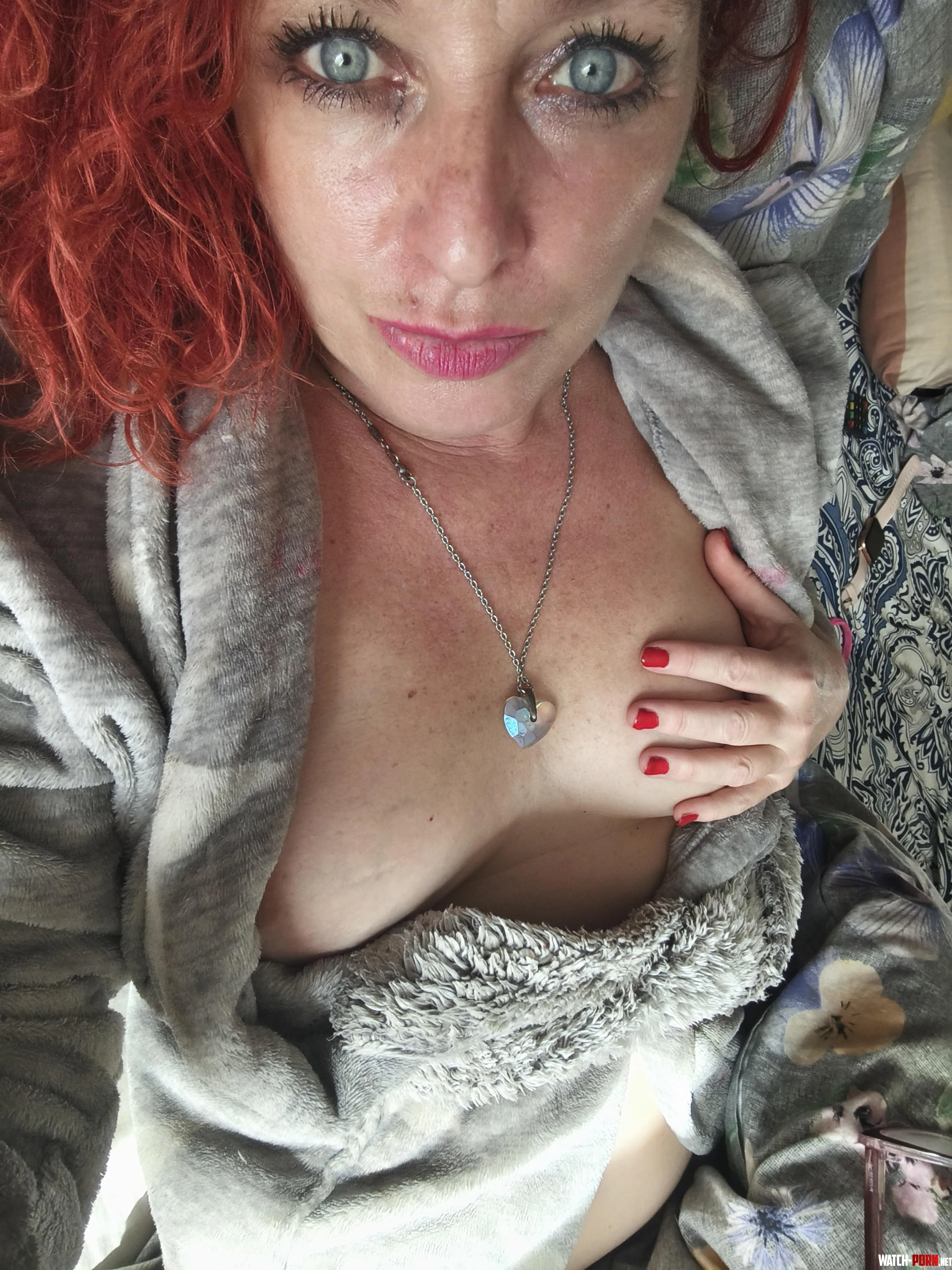 Fiery redhead showing off just a little tease... do you want me to open this robe wider? by MystiqueGinger