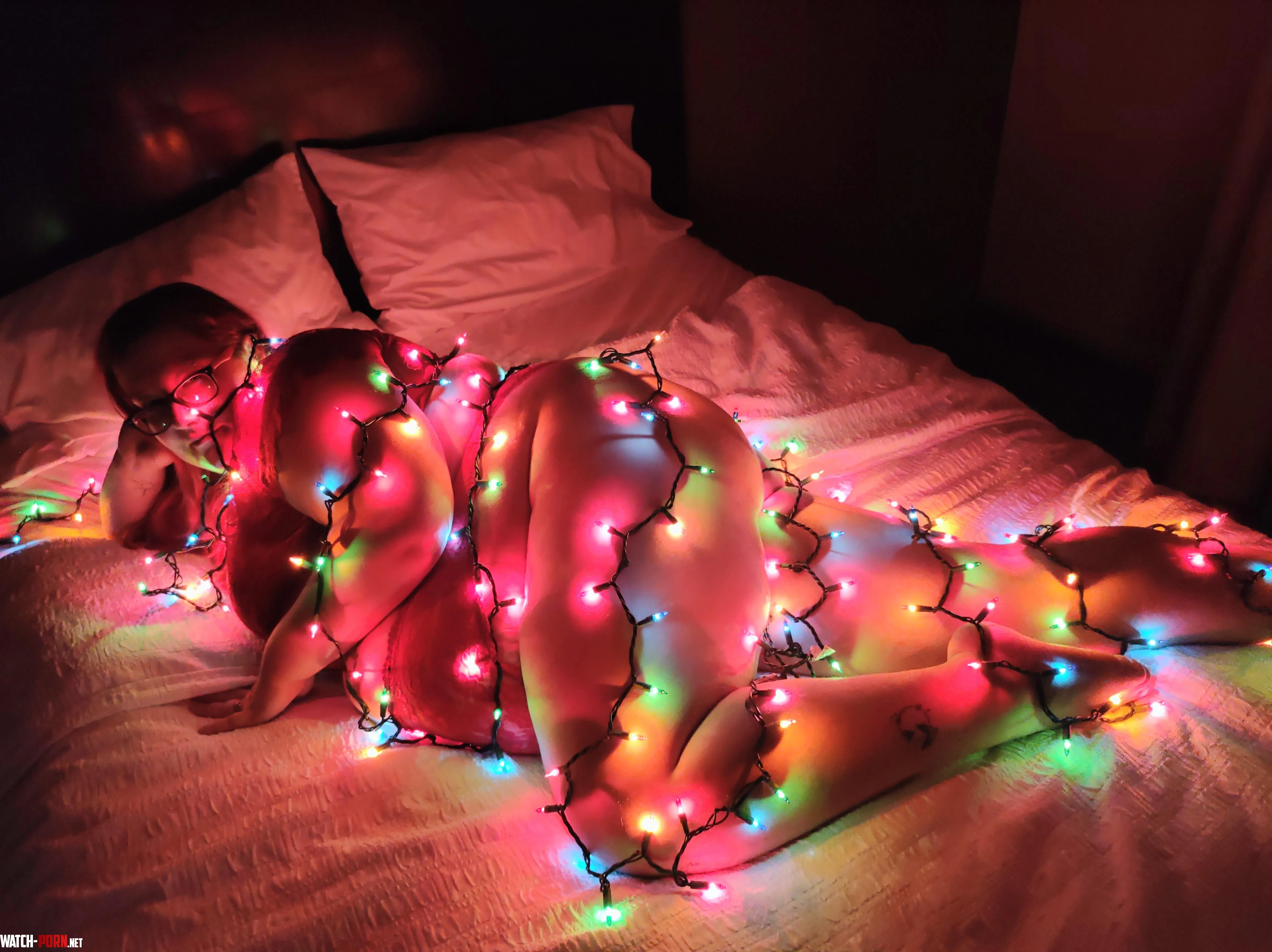 A whole lot of curves wrapped in Christmas lights by highsuccubae