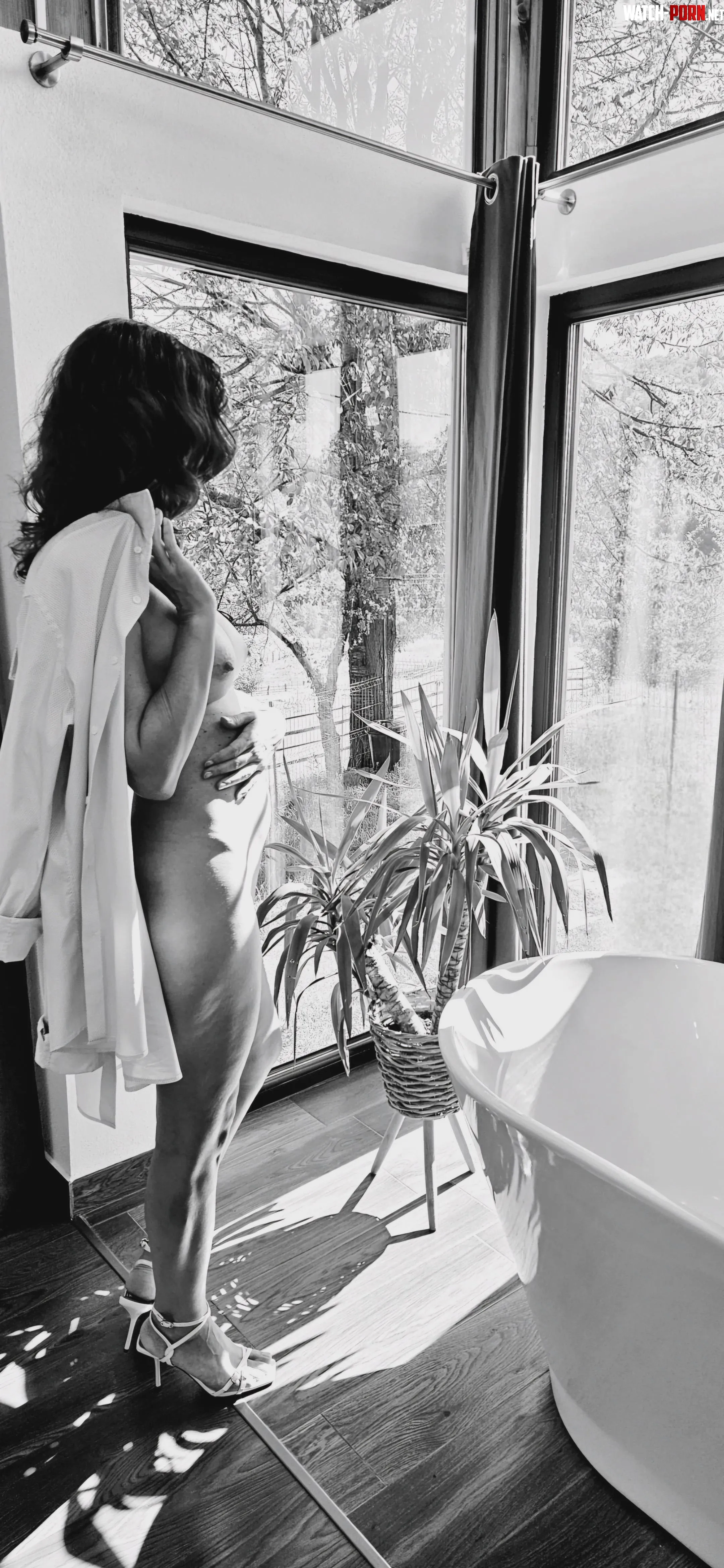 Between light and intention by RedHotEnigma