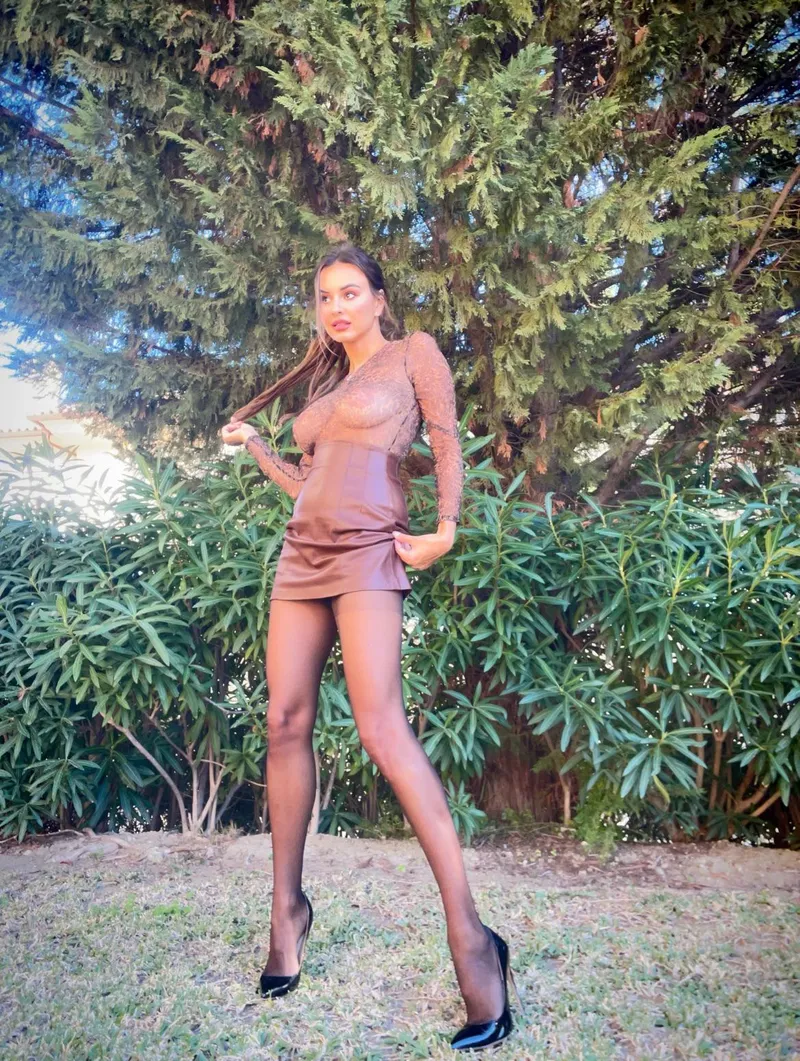 Thumbnail Elegant Pairing: Pantyhose and a Transparent Top