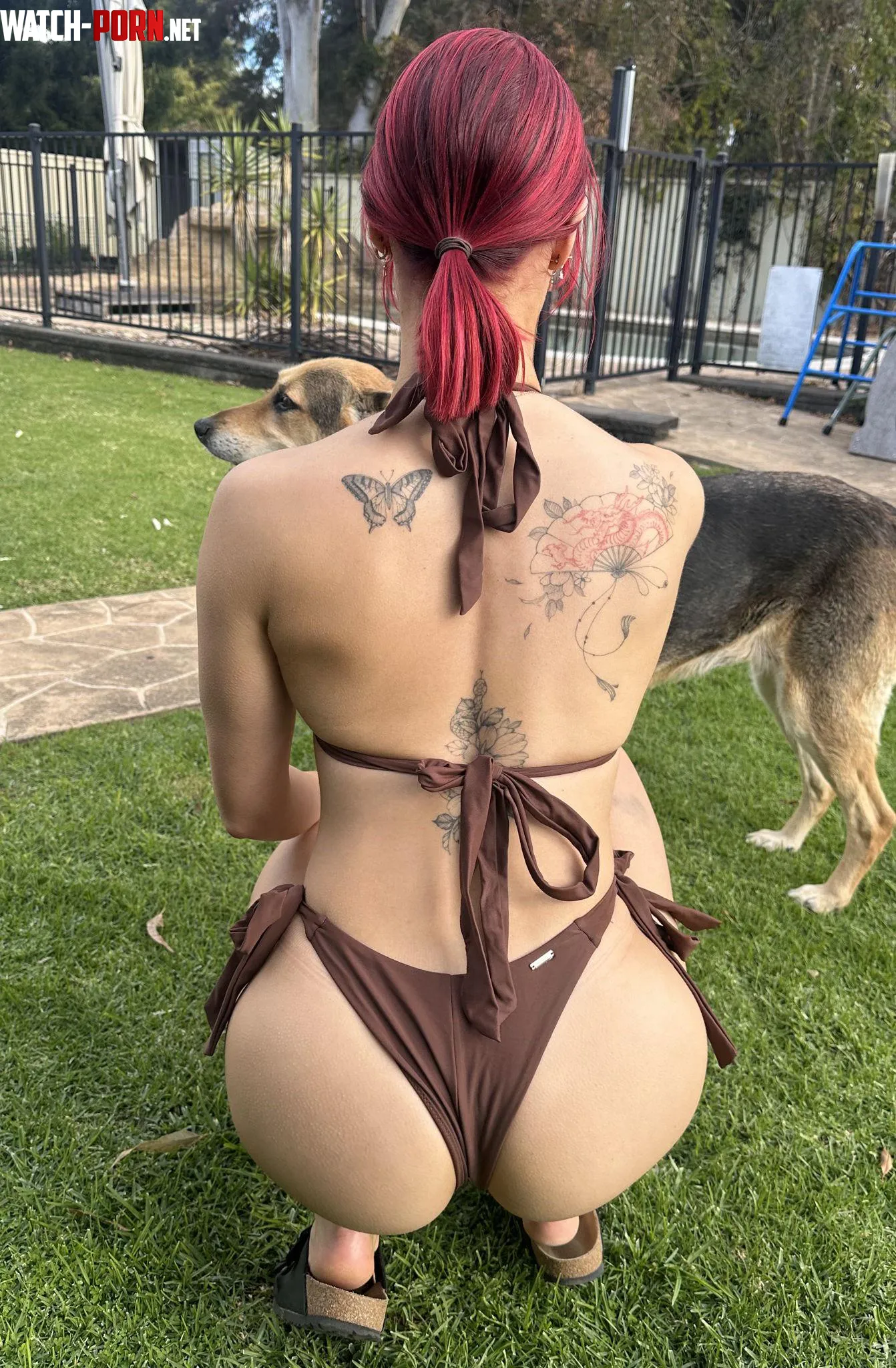 Bright red ponytail and a fat ass oh and dawg hehe by Vegetable_Address195